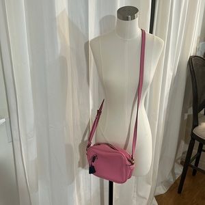 Like new Jcrew signet leather crossbody bag . I’m a fun bright pink!